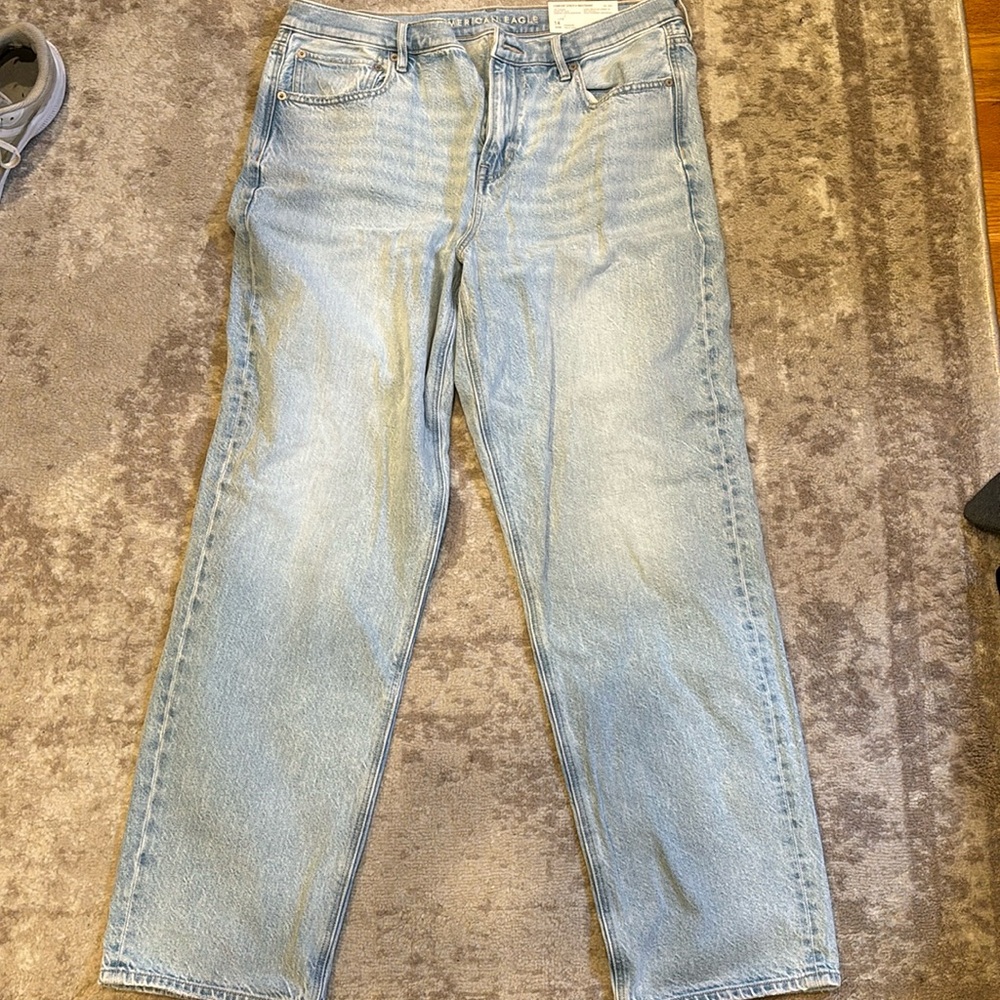 Size 14 90’s style light wash blue jeans from American Eagle